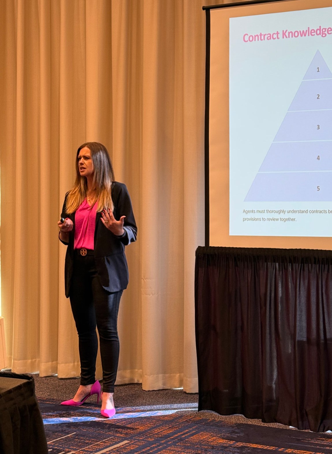 Christin Mack presenting on stage